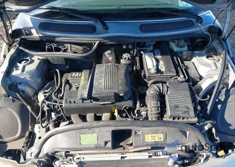 2005 Mini Cooper z USA, uszkodzony, nr VIN WMWRF33435TG10079